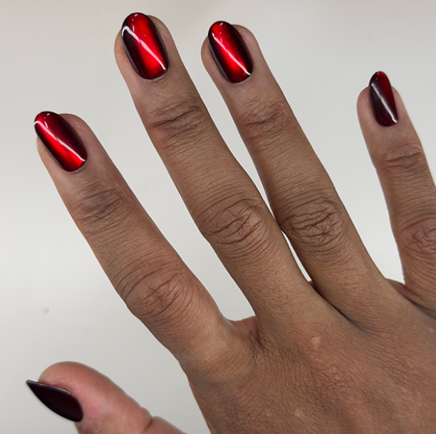 Obsessed Velvet - Press-On | Medium | Oval deep red cat eye velvet finish false nails on natural skin tone hand