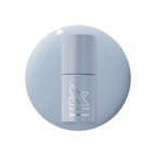 Vintage - Gel polish bottle in a classic denim blue shade on a matching blue gel polish background by Olive and June