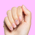 Paint & Play Slime + Nail Set showing hand with pastel pink quick dry polish and cute penguin and star nail art decals thumbnail