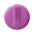 Bottle of Petal - Gel nail polish in bright floral purple shade on matching purple gel polish background