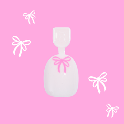 Pink Everything Please - Pressies | Extra Short Short | Round showing baby pink press-on nails with bright pink ribbon design in packaging Pink Everything Please - Pressies | Extra Short Short | Round  Pressies