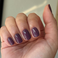 Plum on customer hand