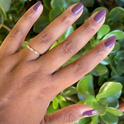 Plum display on hand