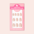 Pointe | Extra Short | Round - Tab Press-On soft ballerina pink press-on nails neatly arranged in pink packaging