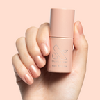 Cookie Swap Gel shimmering beige champagne gel polish on short natural nails for a subtle manicure by Olive and June