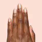 Cookie Swap Gel shimmery beige champagne gel polish on medium-length natural nails for a polished manicure