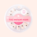 Puffy Vampy Heart - Press-On | Extra Short | Squoval showing nude extra short squoval false nails with 3D dark heart accents in round packaging