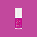 Leotard bottle of quick dry gel polish in vibrant magenta pink shade on matching solid background