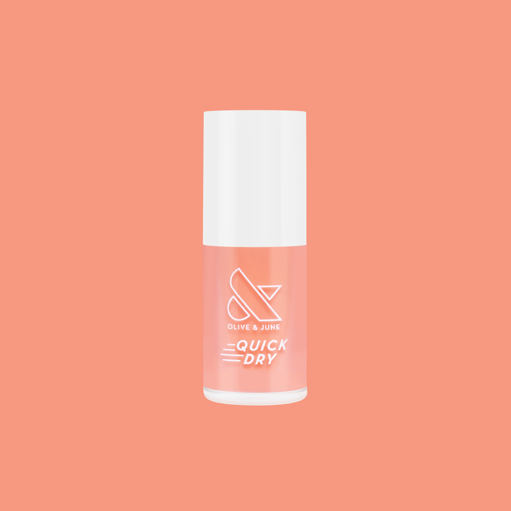 Peeptoe quick dry nail polish bottle in warm peach shade against matching smooth peach background