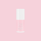 Crown shimmery pink quick dry gel polish bottle on pink background for at home mani and pedi use