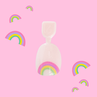 Rainbow Connection - Pressies | Extra Short Short | Round showing pastel pink press on nails with rainbow details in packaging on pink background Rainbow Connection - Pressies | Extra Short Short | Round  Pressies