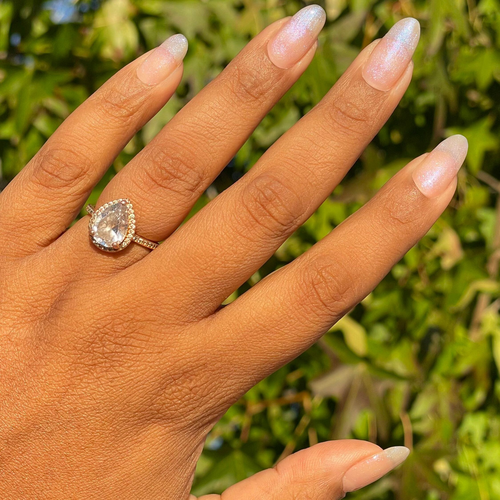 Rose Glaze - Builder Gel on natural long nails with sheer pink iridescent manicure in sunlight outdoors