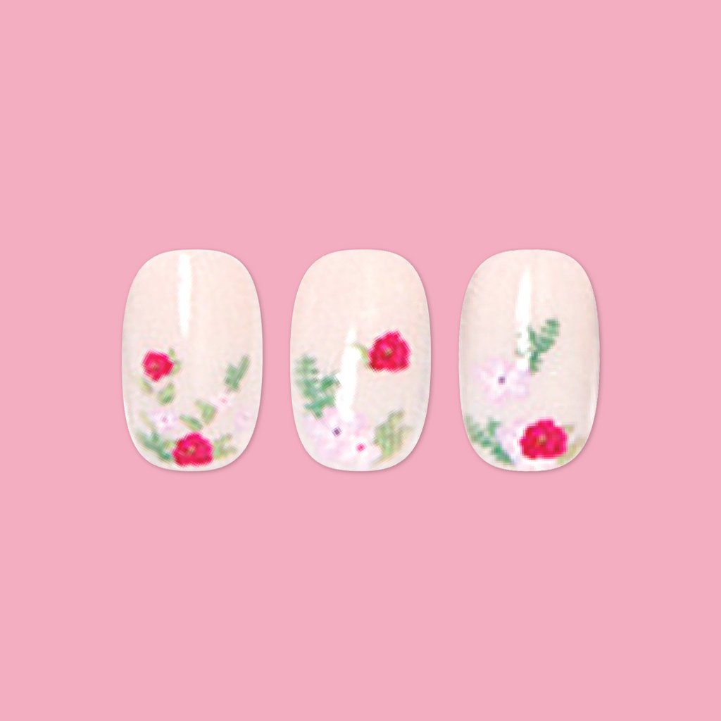 Rose Bouquets - Press-On | Short | Squoval showing short squoval press-on nails with red rose bouquet designs on pink background