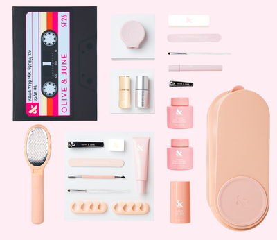The Complete System - 1 Long Lasting Polish with manicure tools and accessories for easy at-home nail care in soft pink tones The Complete System - 1 Long Lasting Polish  System