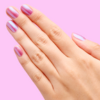 Hand with nails painted in jelly purple-blue iridescent duochrome using SWAK quick dry polish by Olive and June
