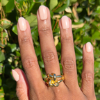 Sandy Shimmer - Press-On | Extra Short | Round shimmery neutral beige press-on nails on hand with ring outdoors