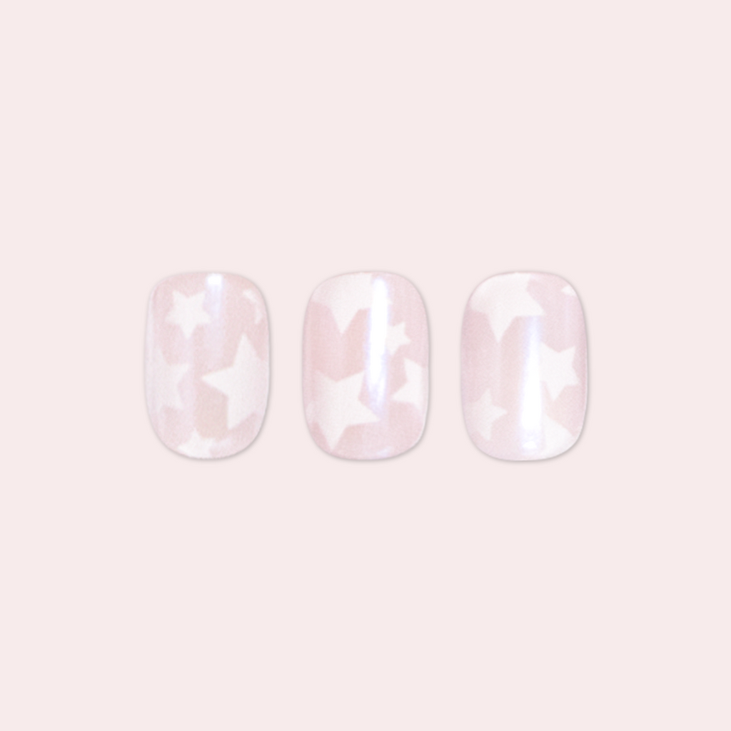 Shimmery Super Star - Press-On | Extra Short | Squoval false nails with star pattern for an easy at-home mani option