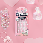 Shiny Pink Has My Heart - Pressies | Extra Short Short | Round showing pink shimmer round press on nails in packaging on pink background
