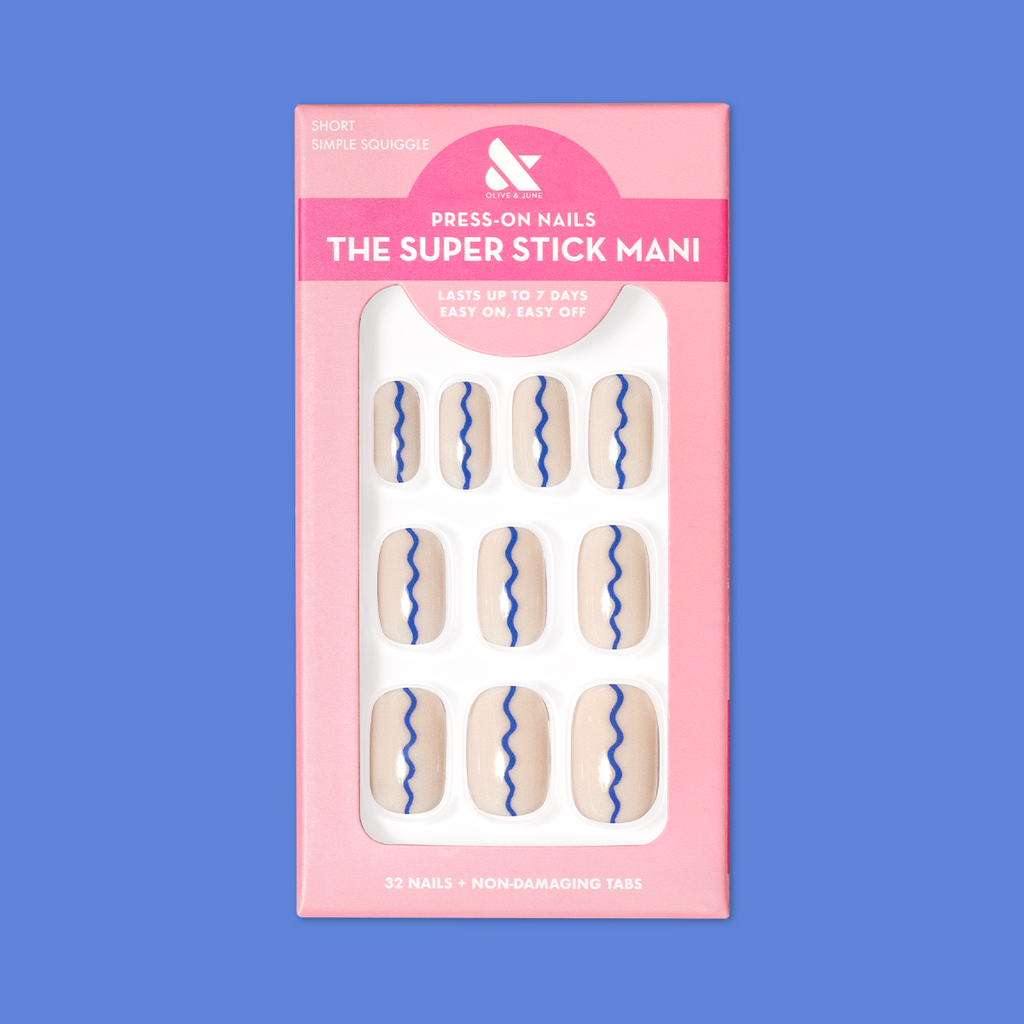 Simple Squiggle | Short | Squoval - Tab Press-On nails with neutral base and blue squiggle design in pink packaging on blue background
