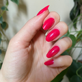 The Sparkle Fairy Effect Top Coat enhancing glossy magenta shimmer on almond-shaped nails for a vibrant manicure look thumbnail