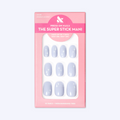 Sparkle Accent | Short | Round - Tab Press-On showing light blue false nails with white sparkle designs in pink packaging