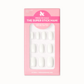 Swan | Extra Short | Squoval - Tab Press-On showing white press-on nails in pink packaging for at-home manicure