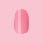 Taffy | Short | Round - Tab Press-On showing glossy sugary sweet pink false nail on a light pink background