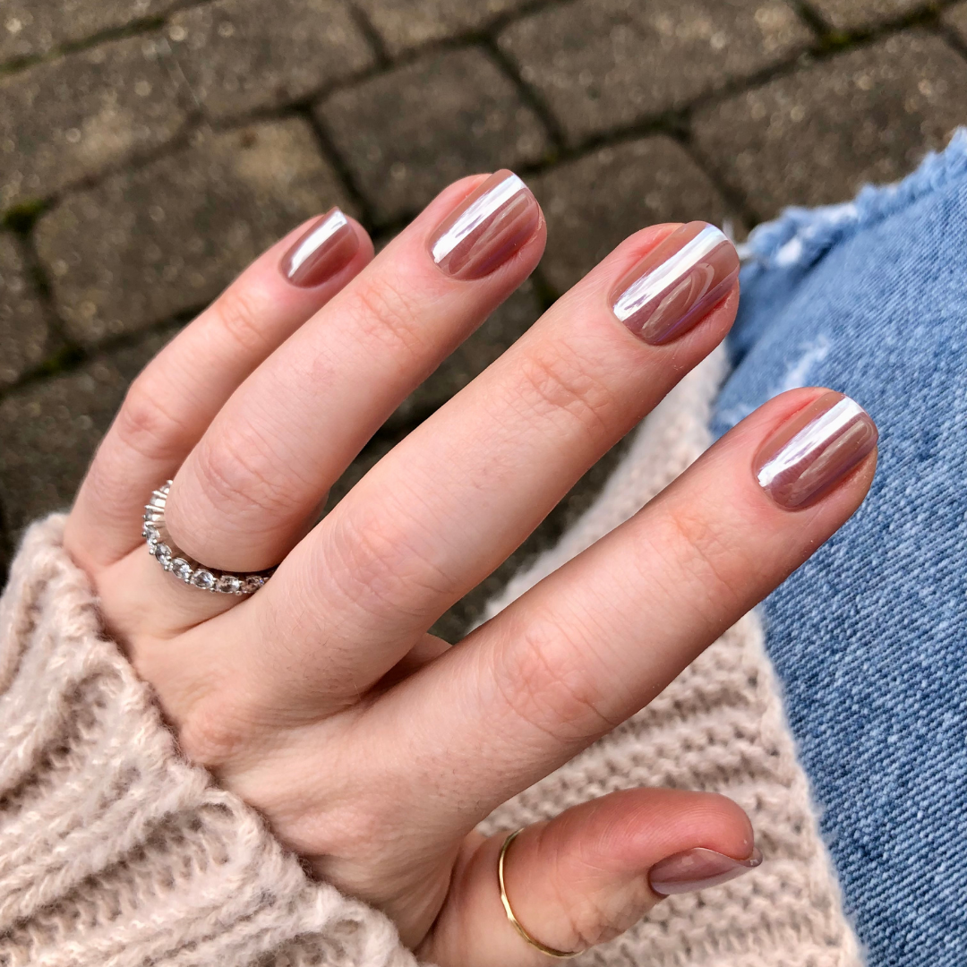 Taupe Jelly Chrome - Press-On | Extra Short | Squoval showing hand with extra short squoval false nails in shimmery taupe chrome finish