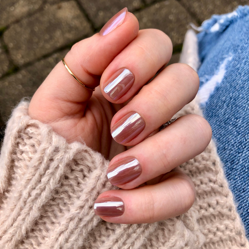 Taupe Jelly Chrome - Press-On | Extra Short | Squoval showing hand with extra short squoval press-on nails in shiny taupe chrome polish