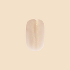 Team Manuscript - Press-On | Short | Squoval showing a single semi-sheer gold glazed short squoval false nail