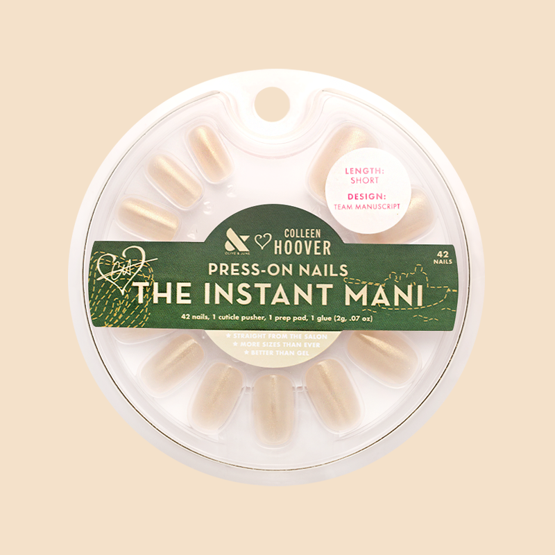 Team Manuscript - Press-On | Short | Squoval showing semi-sheer gold glazed short squoval false nails in circular package