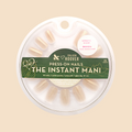 Team Manuscript - Press-On | Short | Squoval showing semi-sheer gold glazed short squoval false nails in circular package