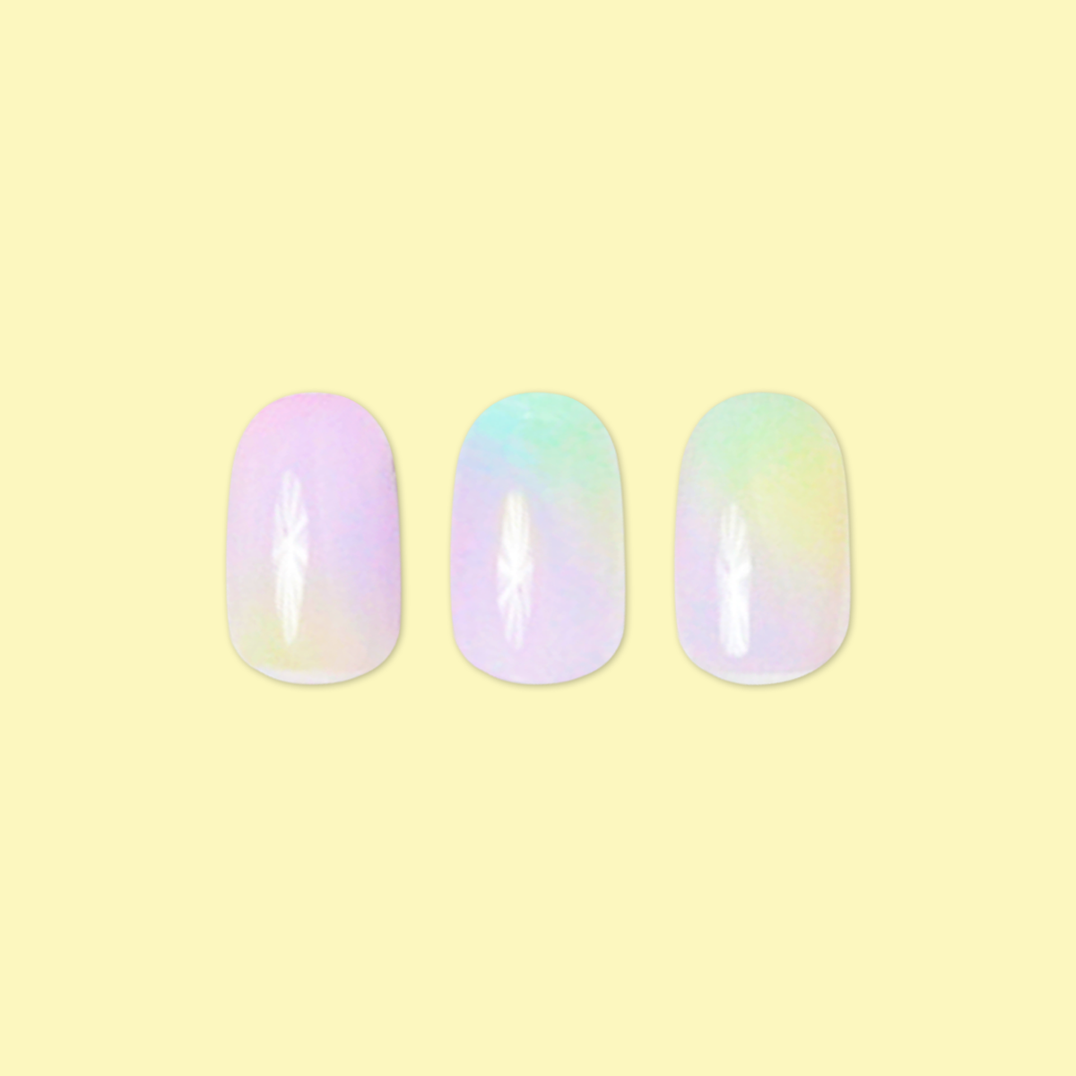 Tie Dye - Press-On | Short | Round showing three short round false nails with pastel rainbow tie-dye design on yellow background