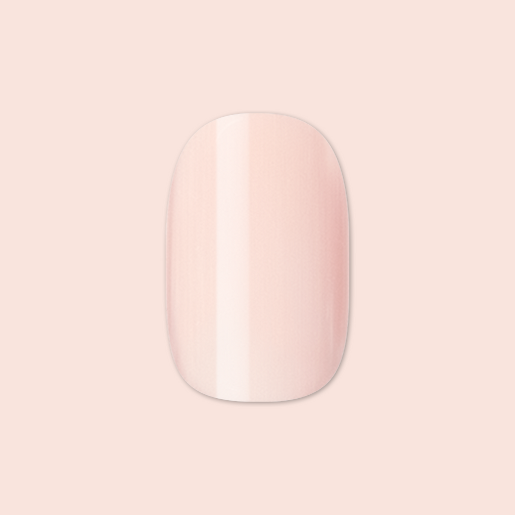 Tutu | Short | Squoval - Tab Press-On showing a single pastel pink false nail for easy at-home mani application