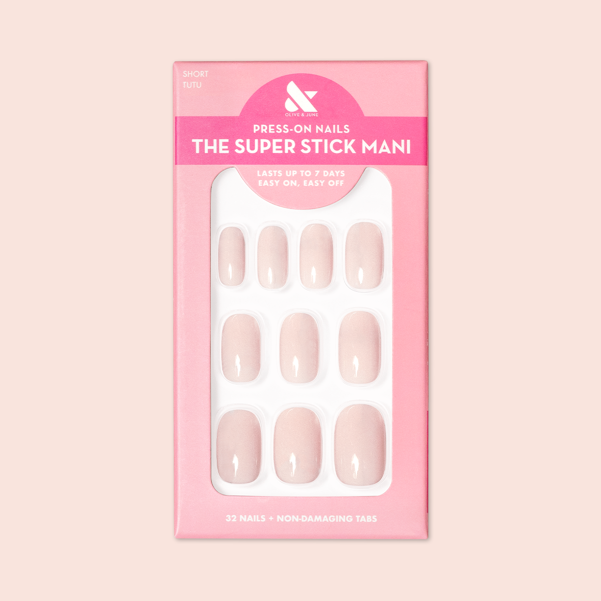 Tutu | Short | Squoval - Tab Press-On nails in soft pastel pink shade displayed in branded packaging for at-home mani.