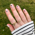Puffy Vampy Heart - Press-On | Extra Short | Squoval showing natural nails with extra short squoval false nails and raised dark heart accents