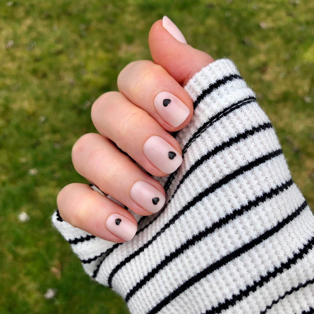 Puffy Vampy Heart - Press-On | Extra Short | Squoval showing neutral mani with 3D black heart accents on extra short squoval false nails