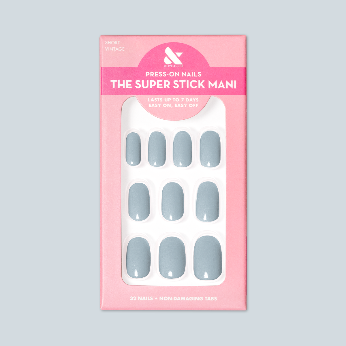 Vintage | Short | Round - Tab Press-On showing vintage denim blue press-on nails in packaging for easy at-home mani application