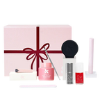 The Mani System manicure kit with polish remover, nail polish, tools, and pink gift box for at-home nail care