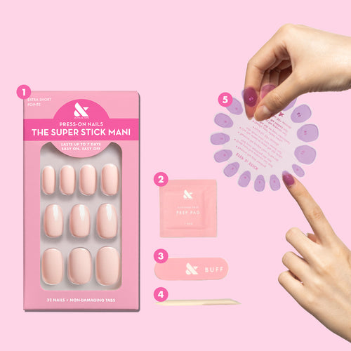 Olive and June's prep pad, buffer file, and cuticle stick on a pink background.