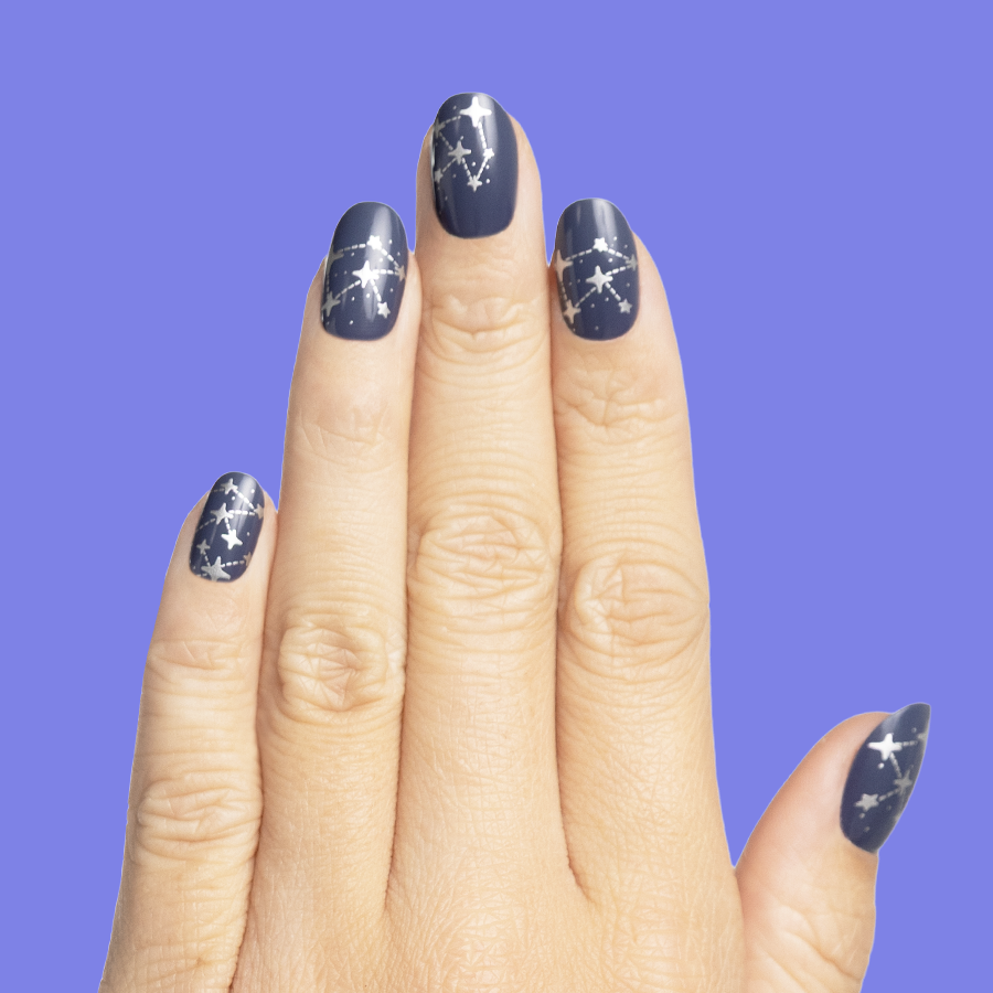 Wish Upon A Star - Pressies | Short Medium | Round showing dark navy press-on nails with silver star constellation nail art manicure