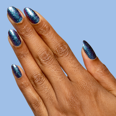 You Obviously Need It iridescent glitter polish with purple-blue shift on natural nails for a sparkling manicure You Obviously Need It silver-blue duochrome shimmer Nail Polish