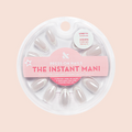 Chrome French - Press-On | Medium | Oval showcasing shiny chrome-tipped medium oval false nails in clear round packaging on pale background
