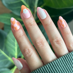 Chrome Flower Mixed Pack - Press-On | Medium | Almond with peach and pink florals and checkered designs on natural hand
