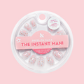 Cowgirl Boot Boogie - Press-On | Extra Short | Round featuring floral and pink cowgirl boot designs on press-on nails in circular packaging