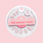 Cowgirl Boot Boogie - Press-On | Extra Short | Round featuring floral and pink cowgirl boot designs on press-on nails in circular packaging