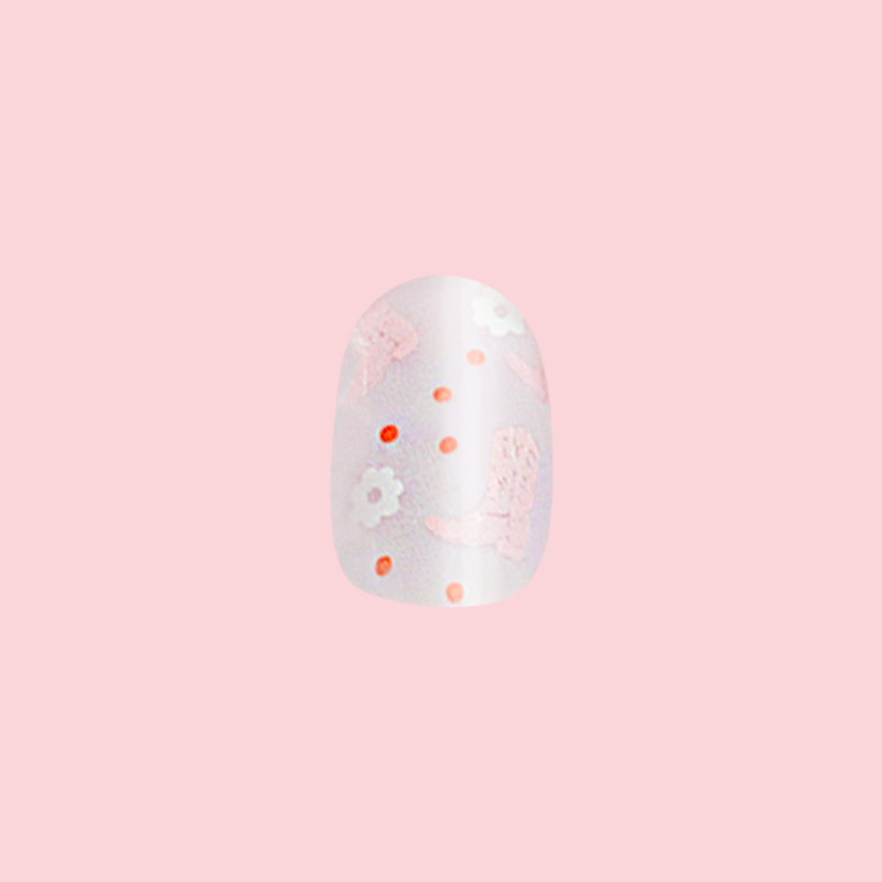 Cowgirl Boot Boogie - Press-On | Extra Short | Round displaying soft pink floral and boot design on a single false nail against pink background