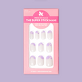 Floral Tip | Short | Round - Tab Press-On nails with neutral base and lavender flower tips in retail pink packaging