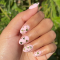 Valentine Mini Polish Set nails with soft pink base and shiny green heart and geometric sequins for a fresh mani look thumbnail