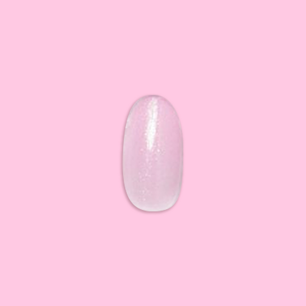 Iridescent Pink - Press-On | Medium | Oval showing single medium oval false nail with soft pink shimmery finish on pink background